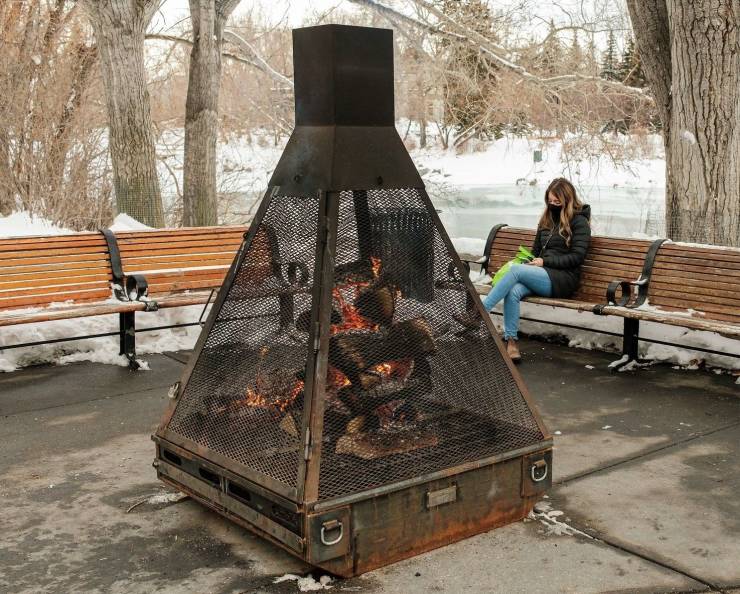 cool funny pics - pyramidal outdoor fireplace cage