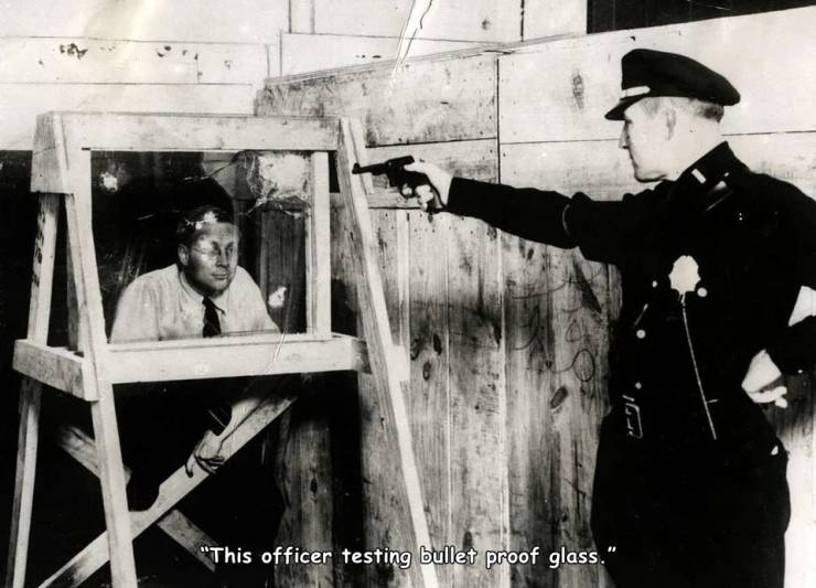 first bullet proof glass - "This officer testing bullet proof glass."