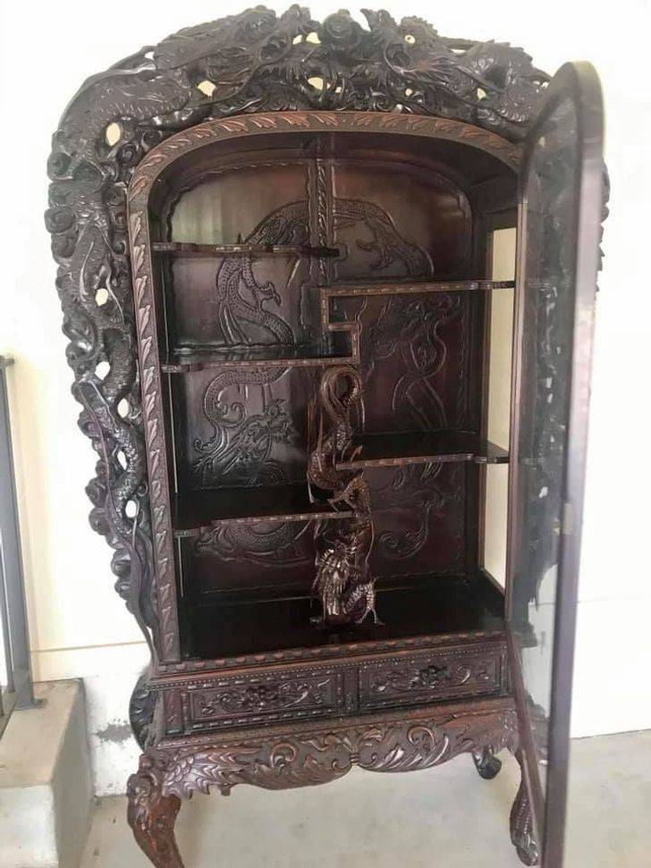 “Saw this gorgeous secondhand curio cabinet on the marketplace and HAD to have it! A 10-hour drive later and it’s ours. It’s made out of rosewood and is nearly 8 feet high.”