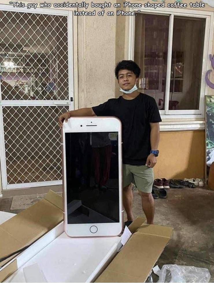 iPhone - This guy who accidentally bought an iPhone shaped coffee table instead of an iPhone." Ex O