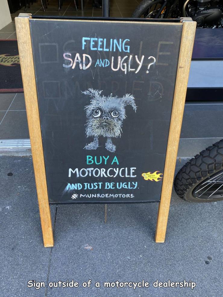 random pics and photos - signage - Feeling Sad And Ugly? Buya Motorcycle And Just Be Ugly. Munroemotors Sign outside of a motorcycle dealership