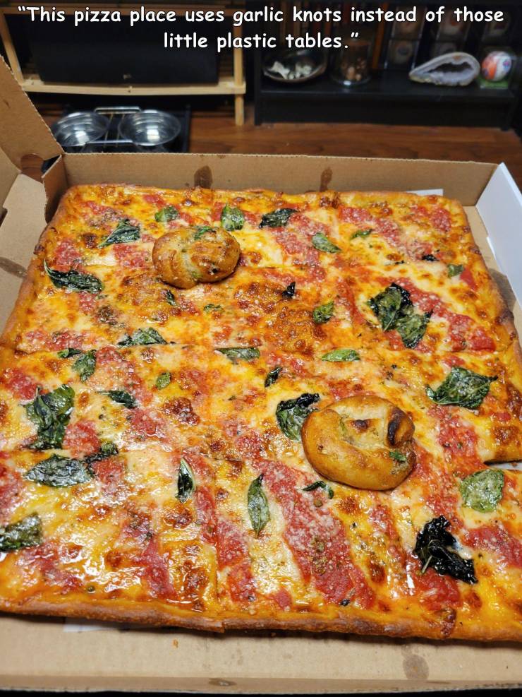 pizza cheese - uses "This pizza place garlic knots instead of those little plastic tables."