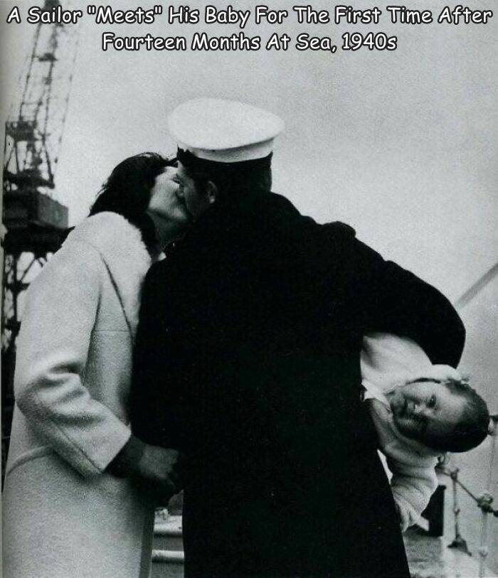 funny pics and random photos - funny seaman - A Sailor "Meets" His Baby For The First Time After Fourteen Months At Sea, 1940s