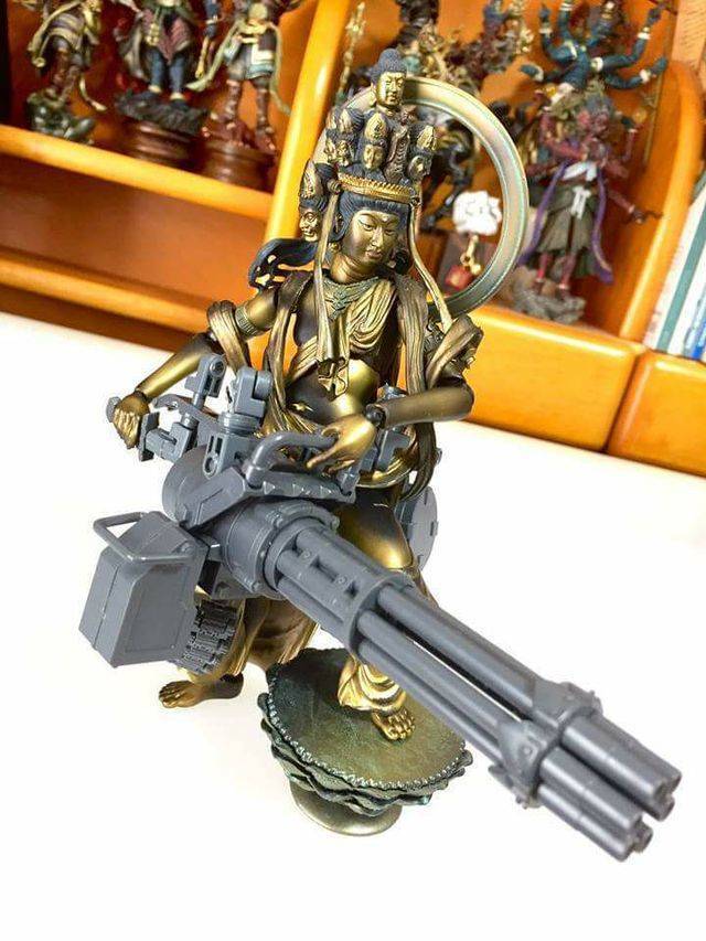 buddha with gun -