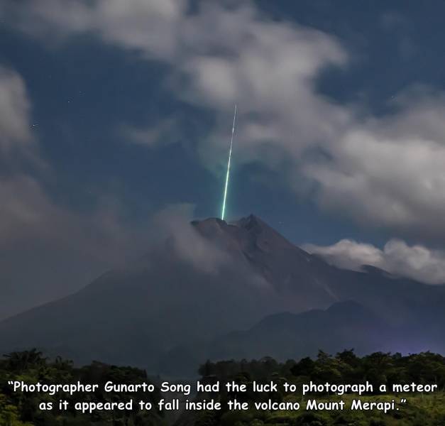 sky - "Photographer Gunarto Song had the luck to photograph a meteor as it appeared to fall inside the volcano Mount Merapi."