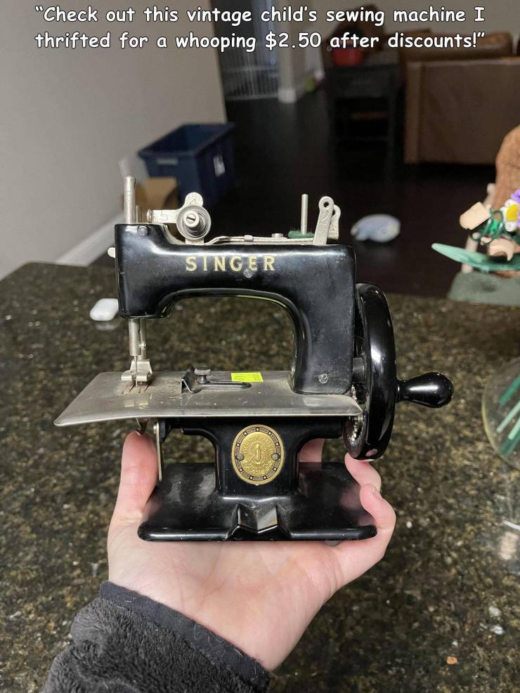sewing machine - "Check out this vintage child's sewing machine I thrifted for a whooping $2.50 after discounts!" Singer