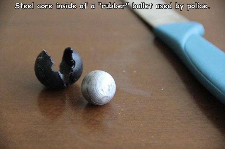 rubber coated steel bullets - Steel core inside of a rubber" bullet used by police.