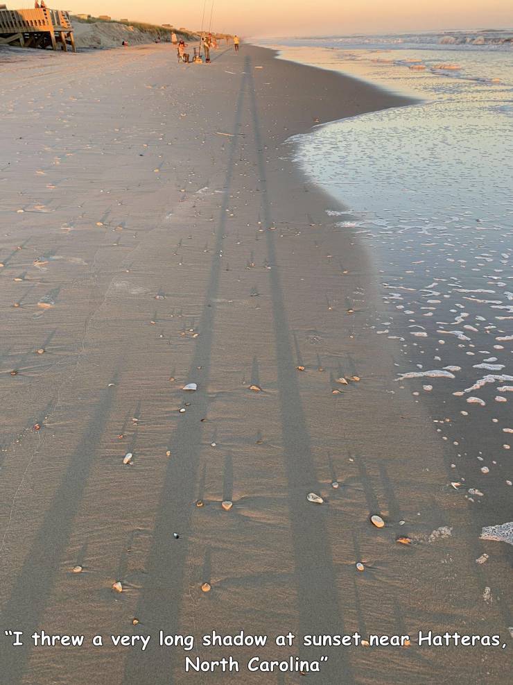 funny random photos - sea - "I threw a very long shadow at sunsetnear Hatteras, North Carolina"