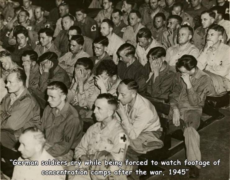 German soldiers cry while being forced to watch footage of concentration camps after the war, 1945"