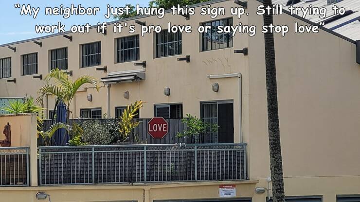 daily dose of randoms - residential area - "My neighbor just hung this sign up. Still trying to work out if it's pro love or saying stop love" Love ww