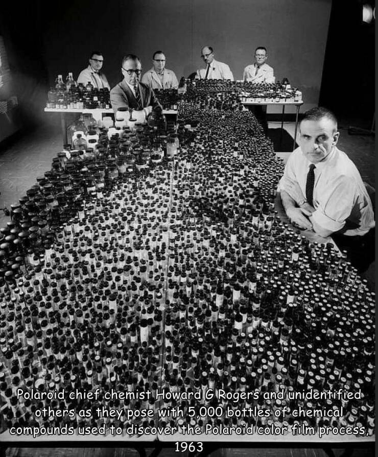daily dose of randoms - howard rogers polaroid - Polaroid chief chemist Howard G Rogers and unidentified others as they pose with 5,000 bottles of chemical compounds used to discover the Polaroid color film process. 1963