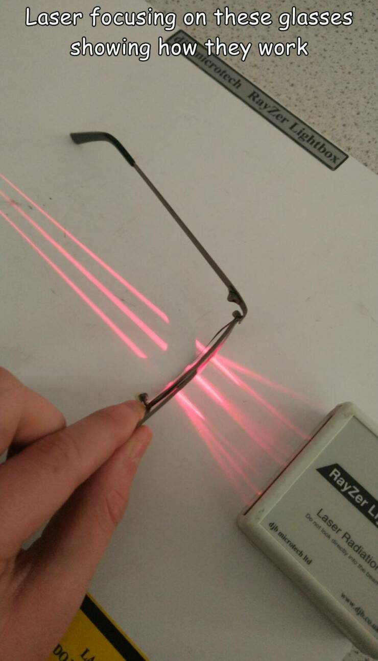 cool pics and photos - material - Laser focusing on these glasses showing how they work Do crotech RayZer Lightbox RayZer L Laser Radiation Do not look directly into the bearf djb microtech Itd