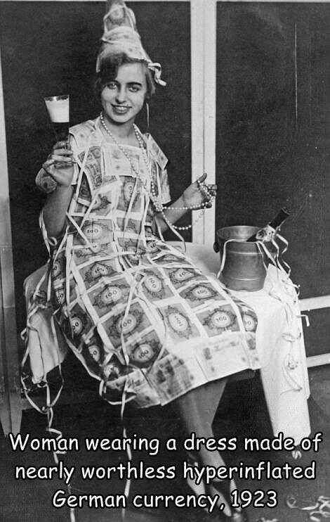 cool random pics -  140 100 foo 200 Woman wearing a dress made of nearly worthless hyperinflated German currency, 1923