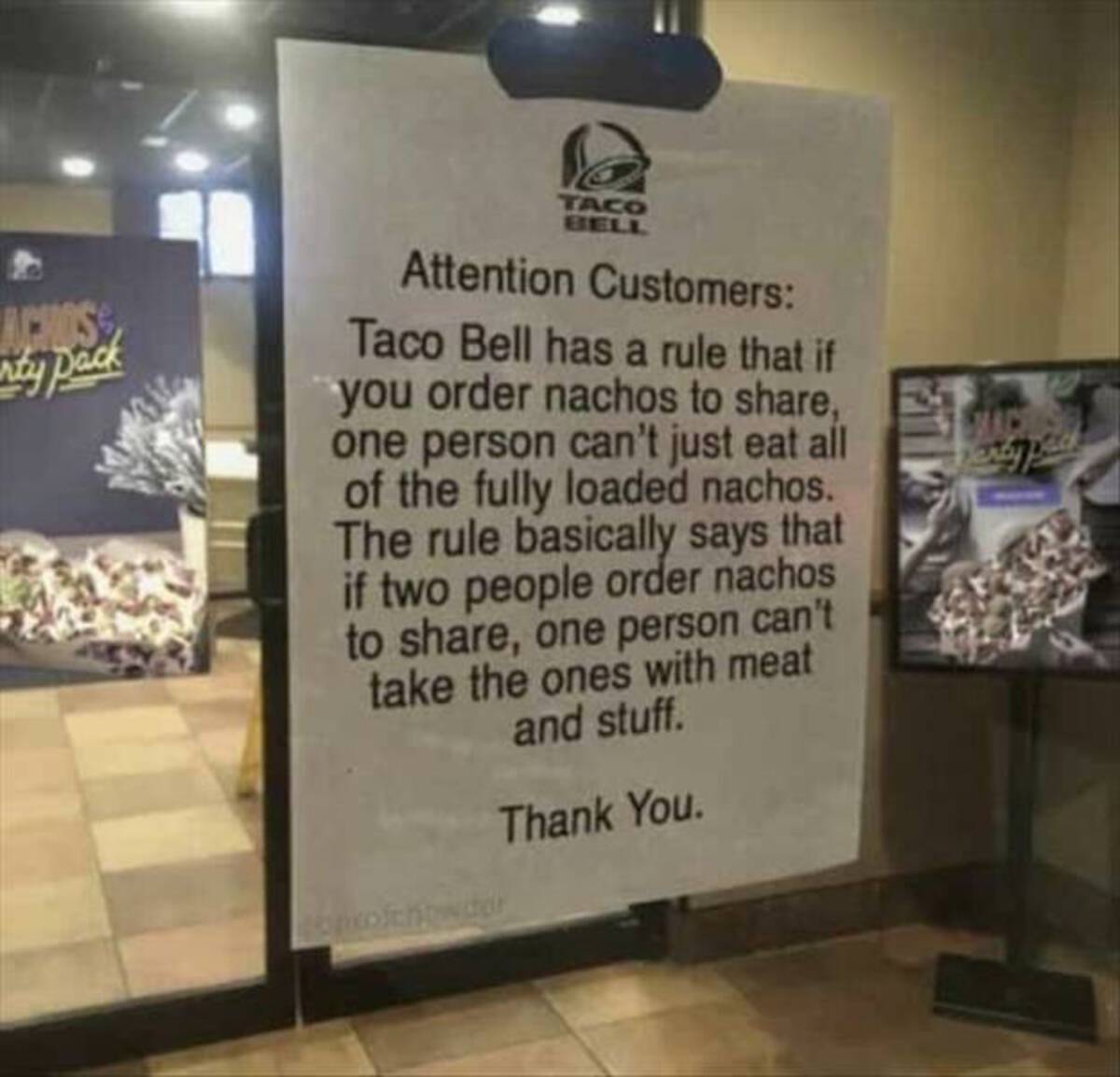 banner - Achos ty pack Taco Bell Attention Customers Taco Bell has a rule that if you order nachos to , one person can't just eat all of the fully loaded nachos. The rule basically says that if two people order nachos to , one person can't take the ones w