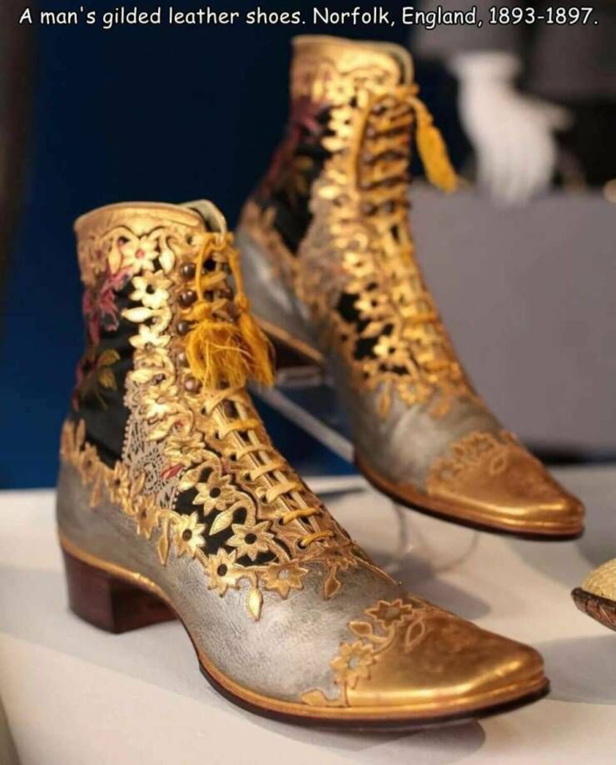 work boots - A man's gilded leather shoes. Norfolk, England, 18931897.