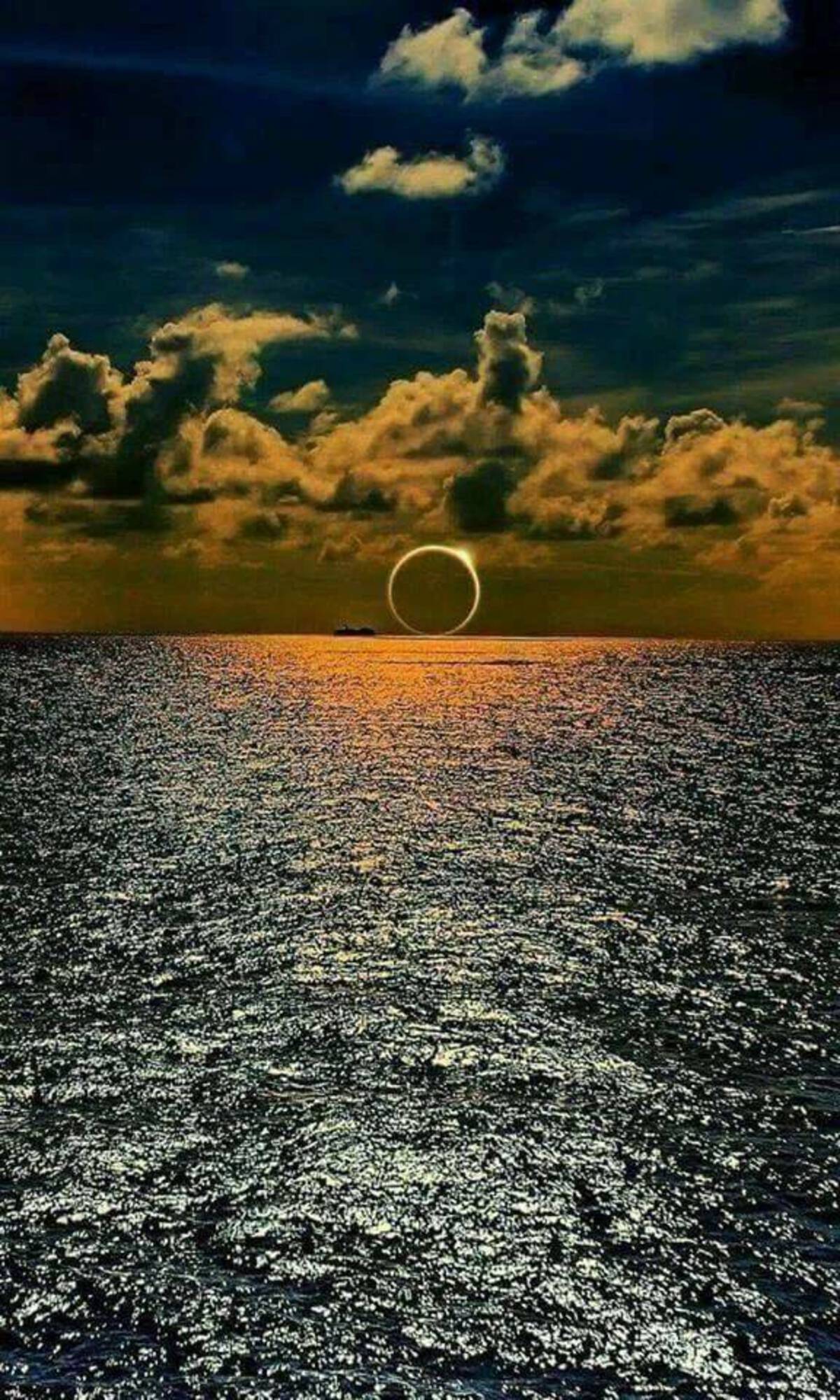 solar eclipse over ocean