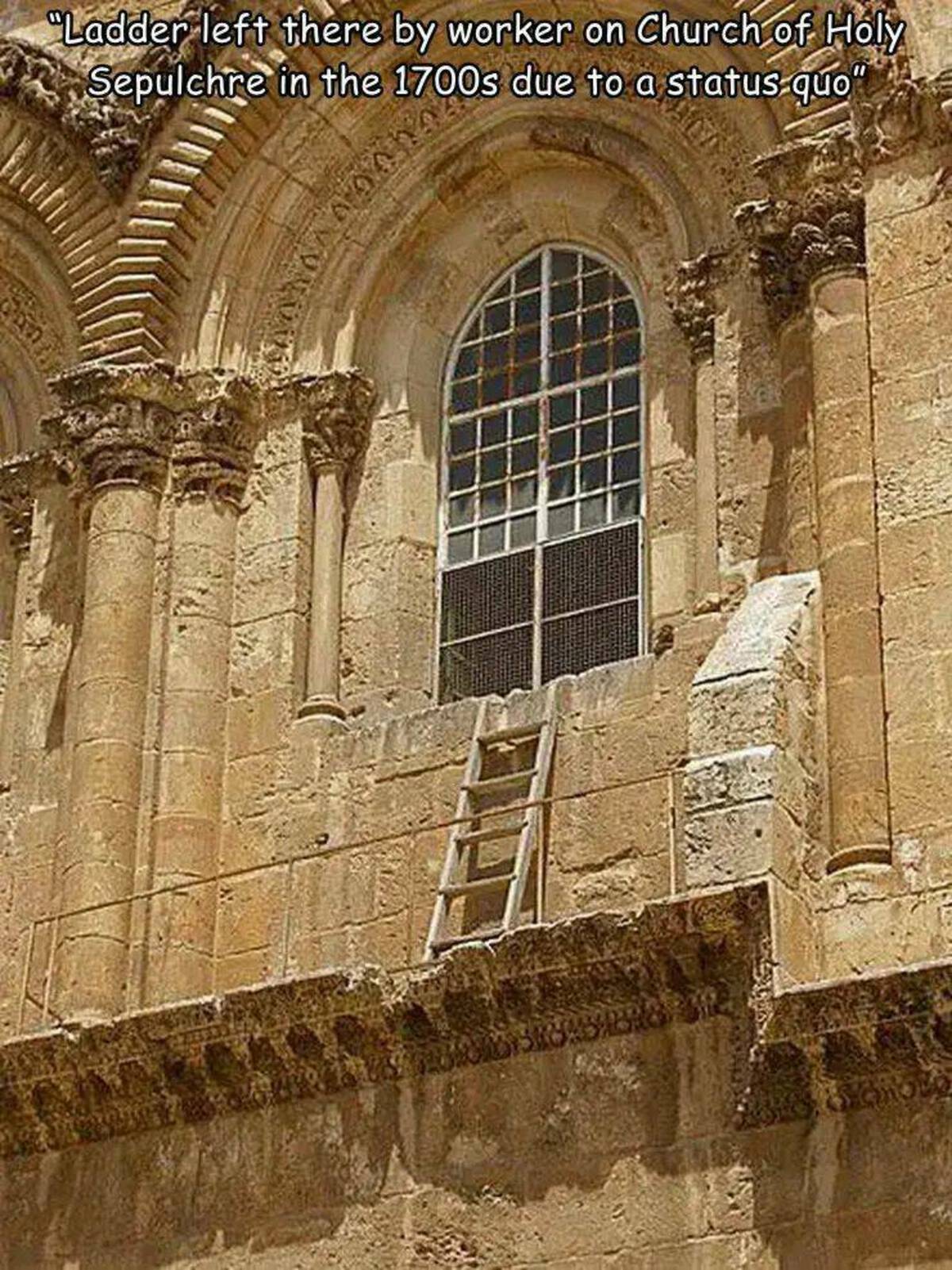 church of the holy sepulchre ladder - "Ladder left there by worker on Church of Holy Sepulchre in the 1700s due to a status quo"