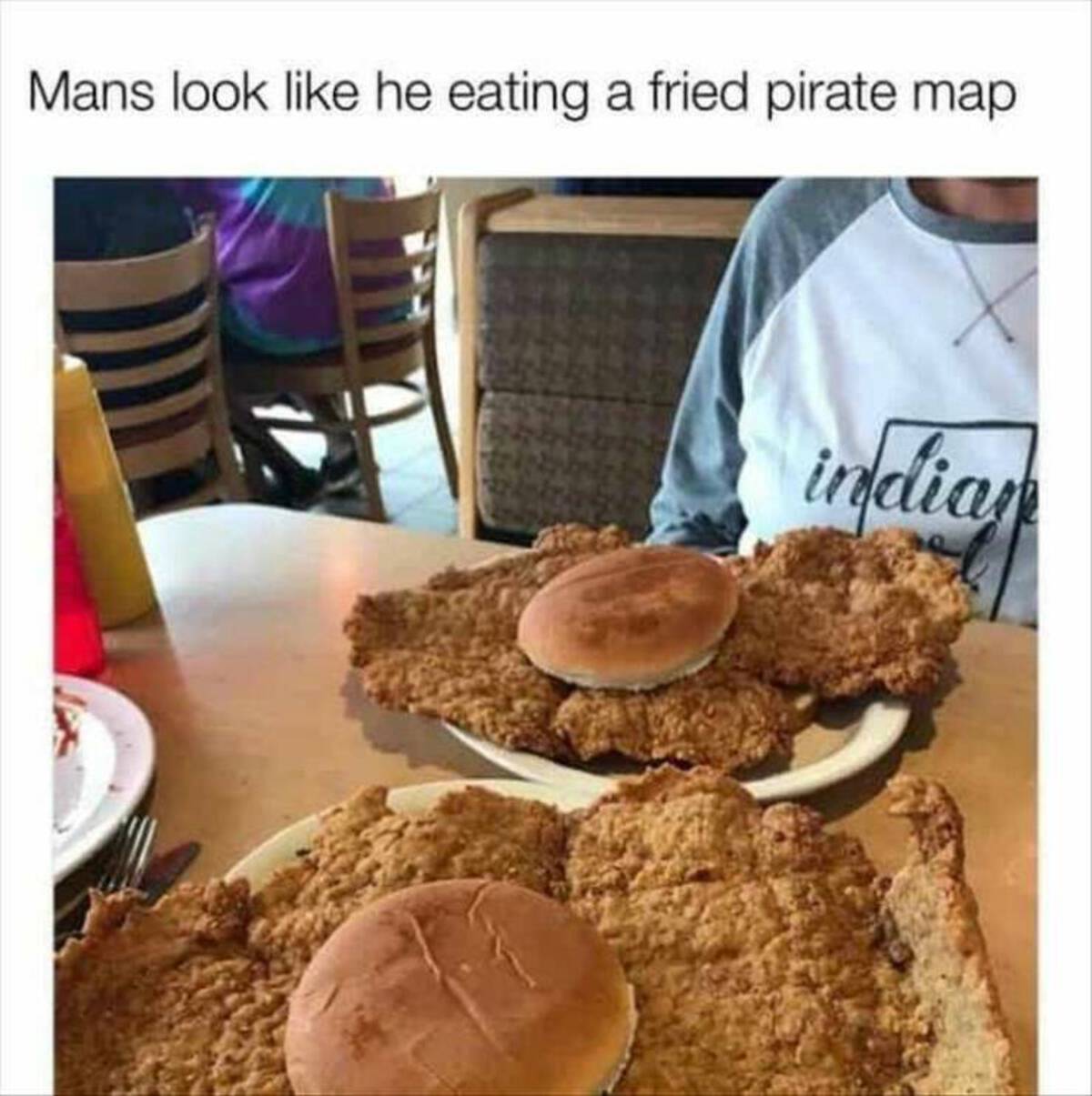eat a pork tenderloin sandwich - Mans look he eating a fried pirate map india