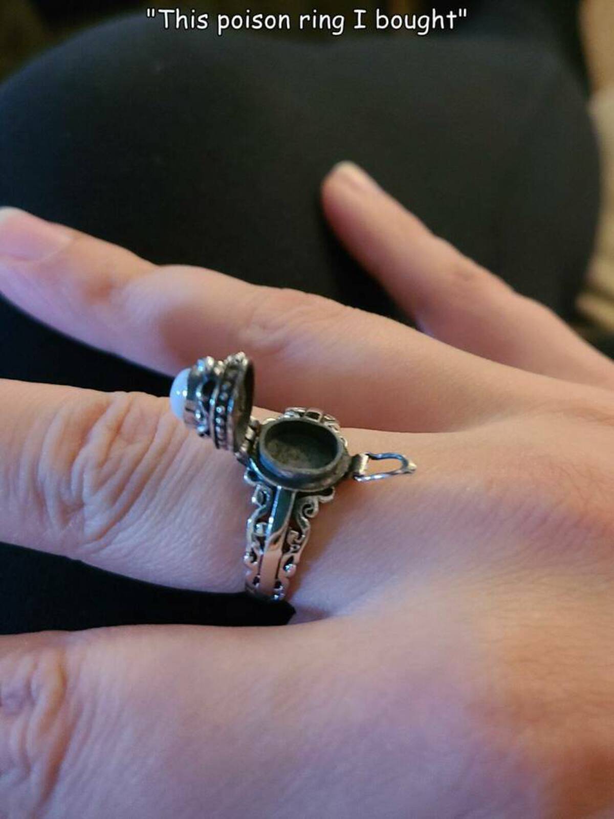 pre-engagement ring - "This poison ring I bought"