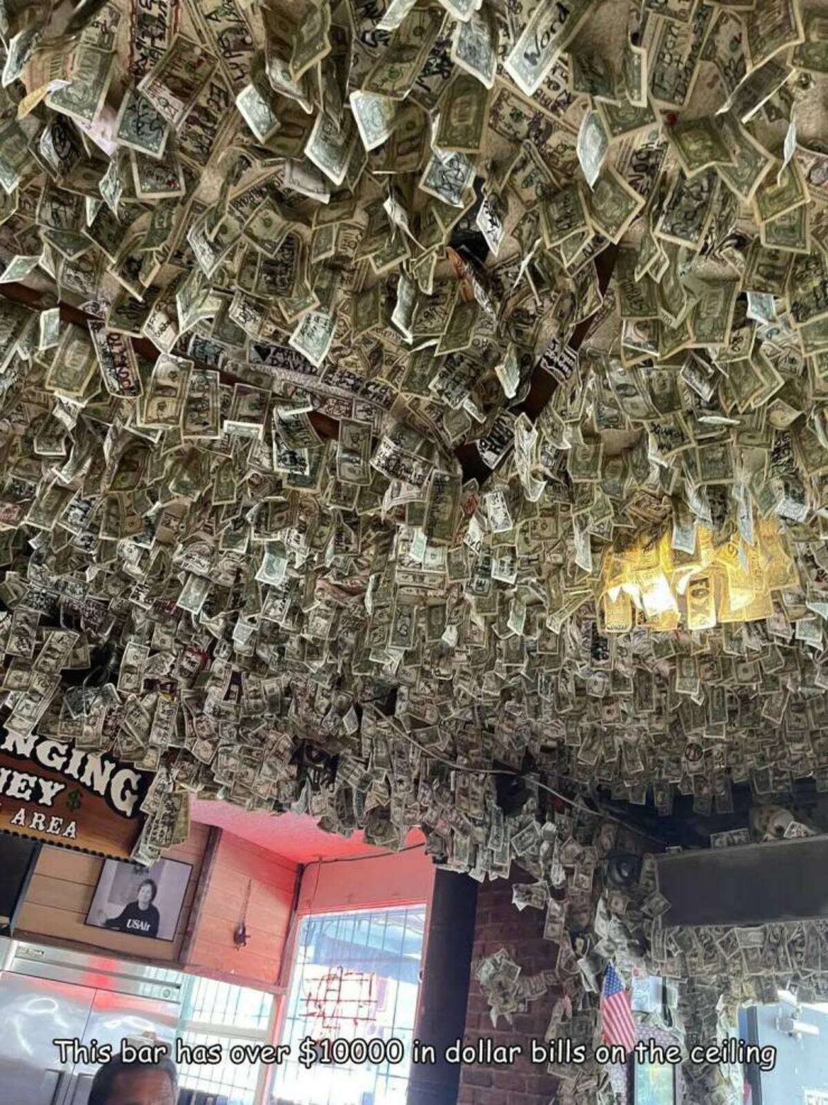 ceiling - Nging Hey$ Area USAir Word 110 This bar has over $10000 in dollar bills on the ceiling