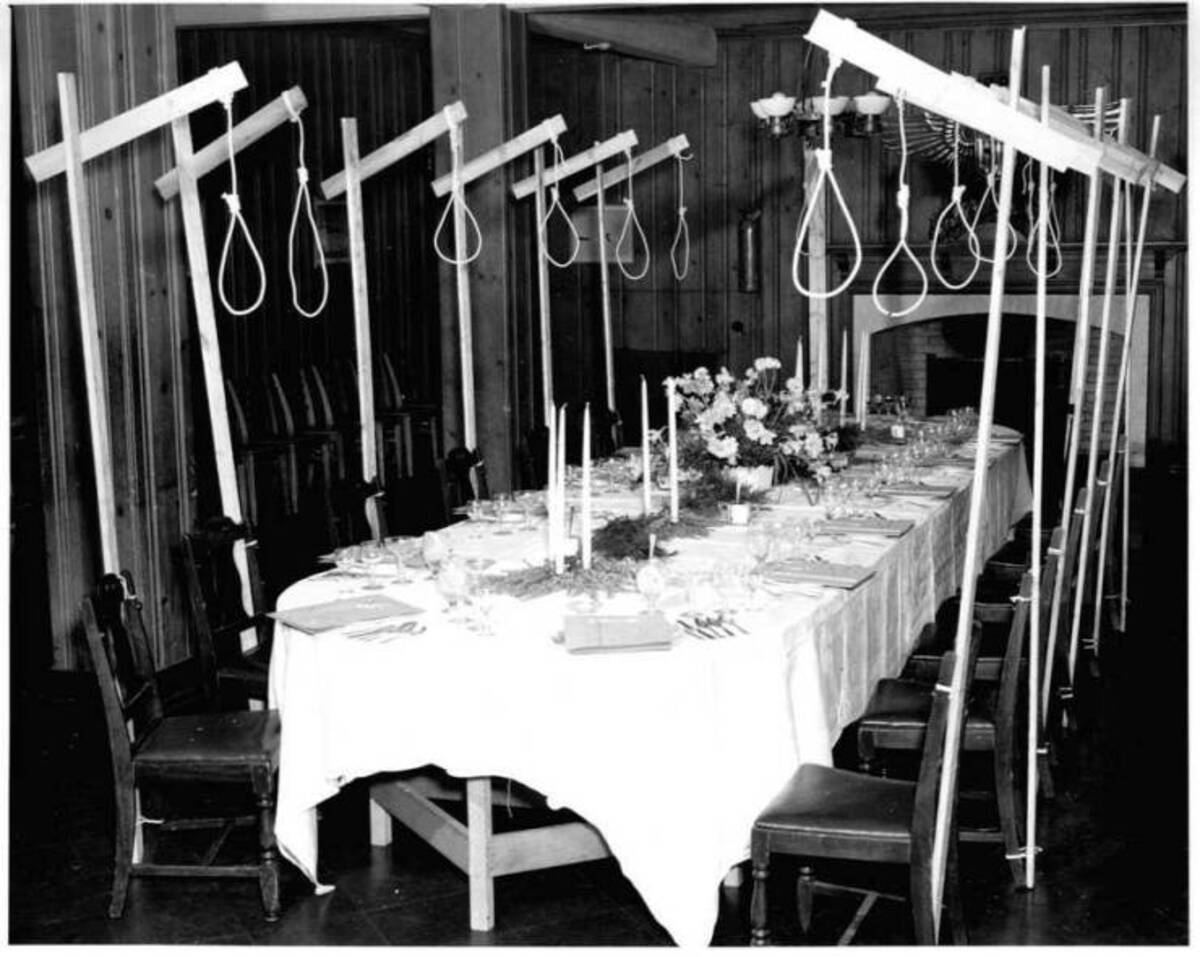 dinner table set up for 14 unsuspecting guests in 1946