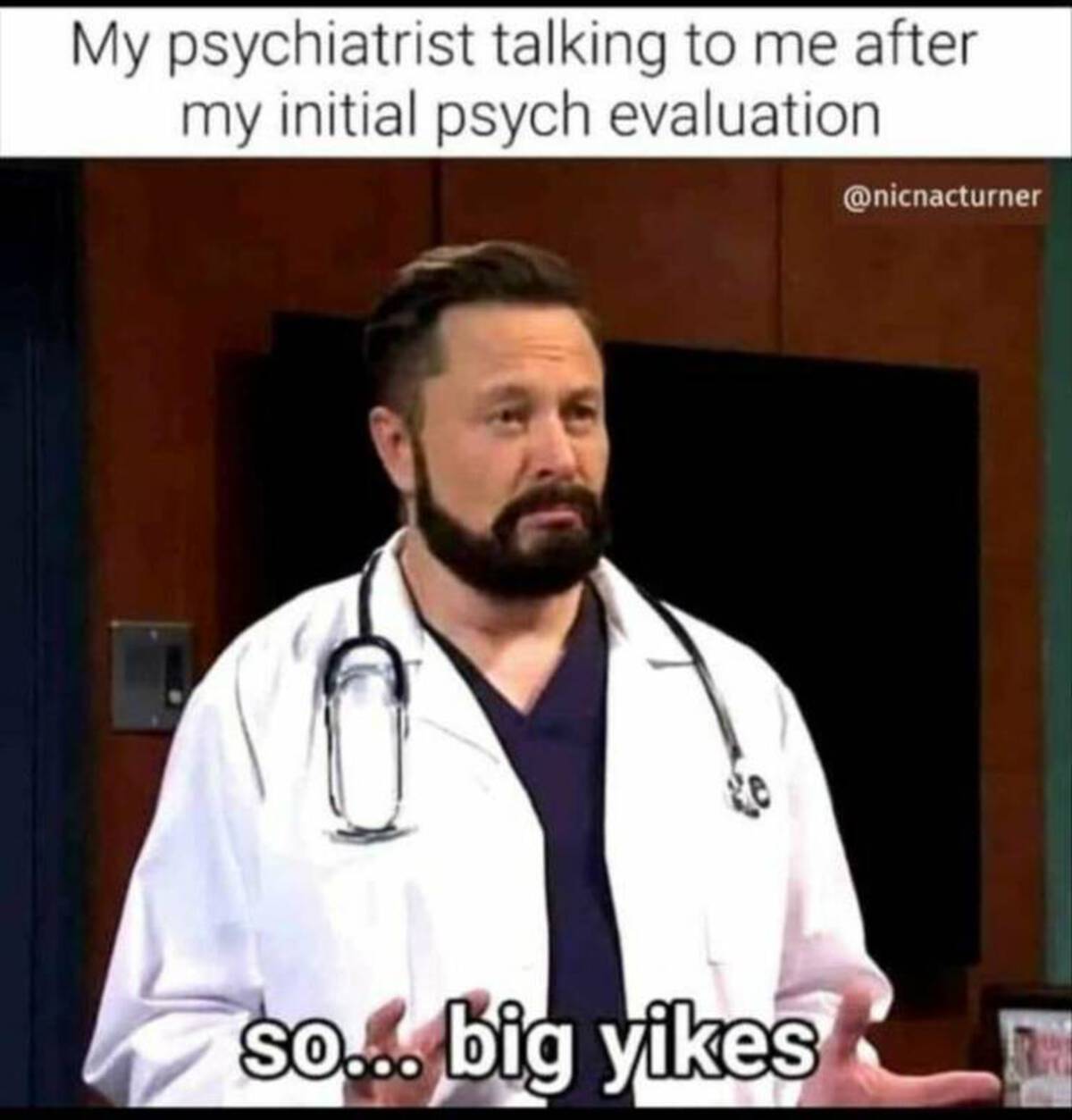 photo caption - My psychiatrist talking to me after my initial psych evaluation so... big yikes