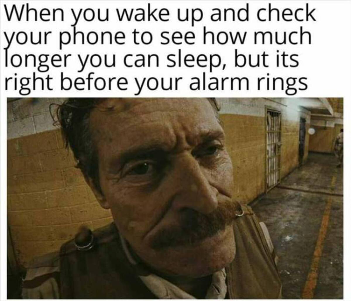 photo caption - When you wake up and check your phone to see how much longer you can sleep, but its right before your alarm rings