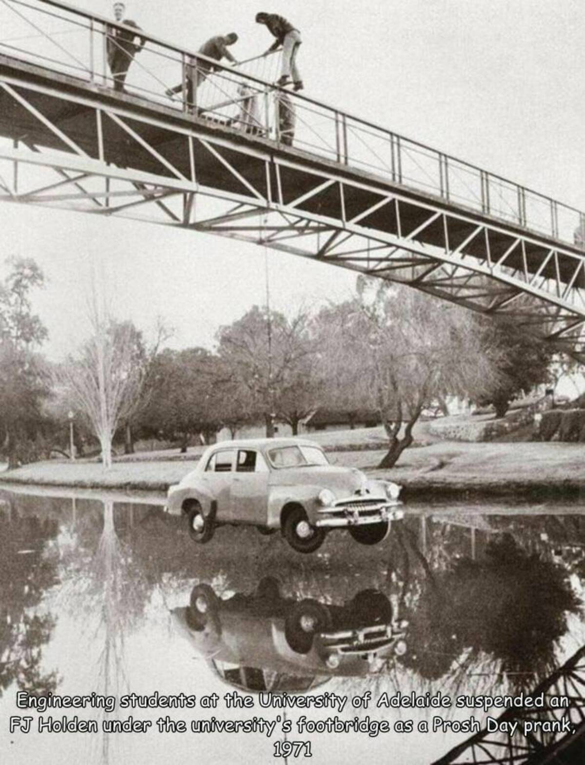 adelaide uni footbridge prank - Engineering students at the University of Adelaide suspended an Fj Holden under the university's footbridge as a Prosh Day prank, 1971