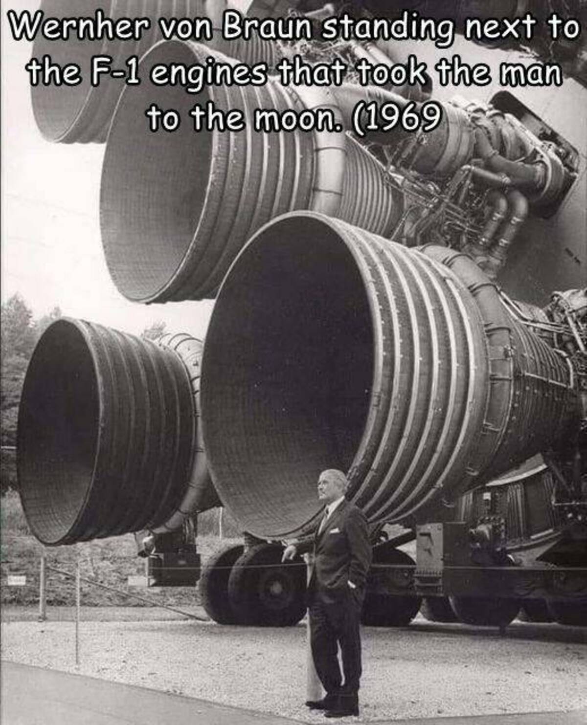 megalophobia rocket - Wernher von Braun standing next to the F1 engines that took the man to the moon. 1969