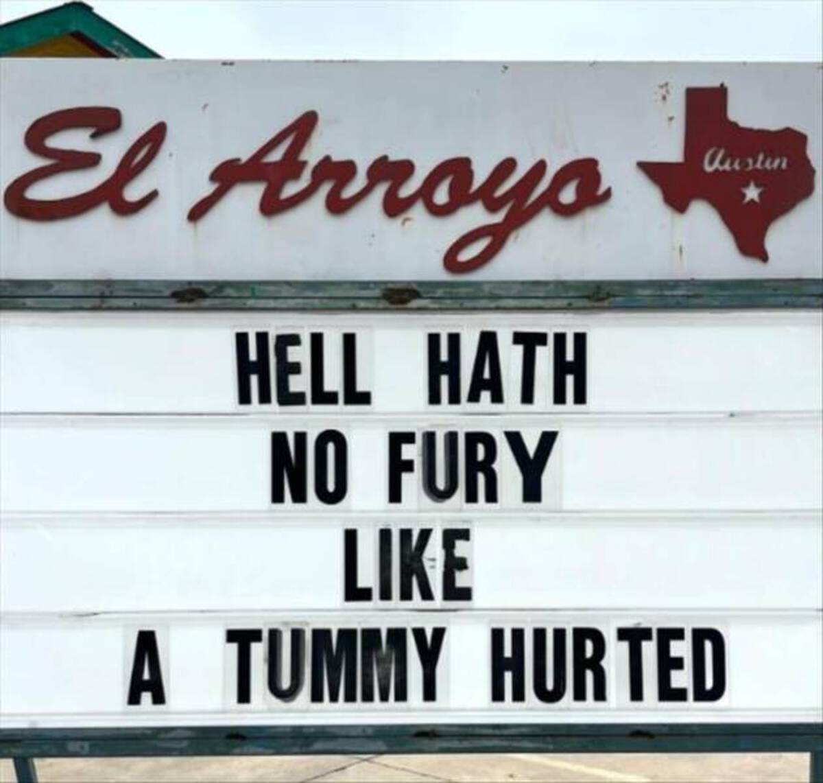 street sign - El Arroyo Hell Hath No Fury A Tummy Hurted Austin