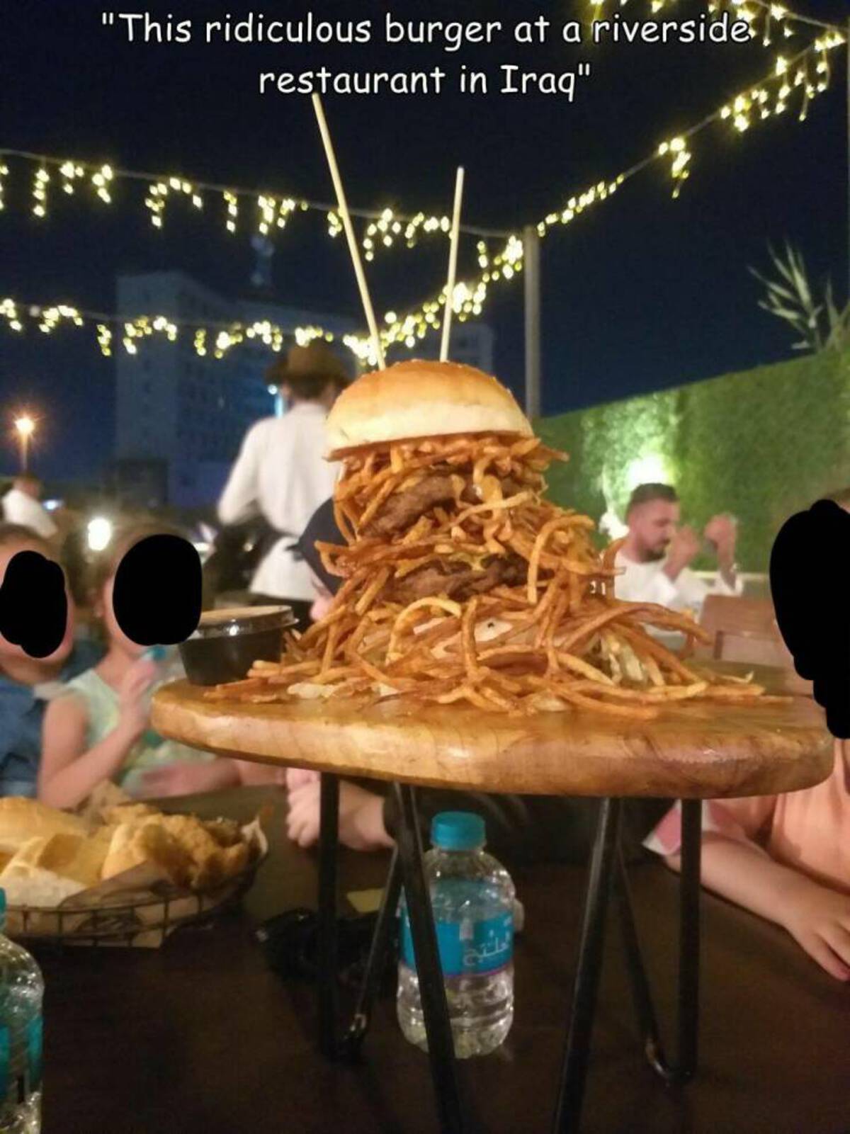 baked goods - "This ridiculous burger at a riverside restaurant in Iraq"