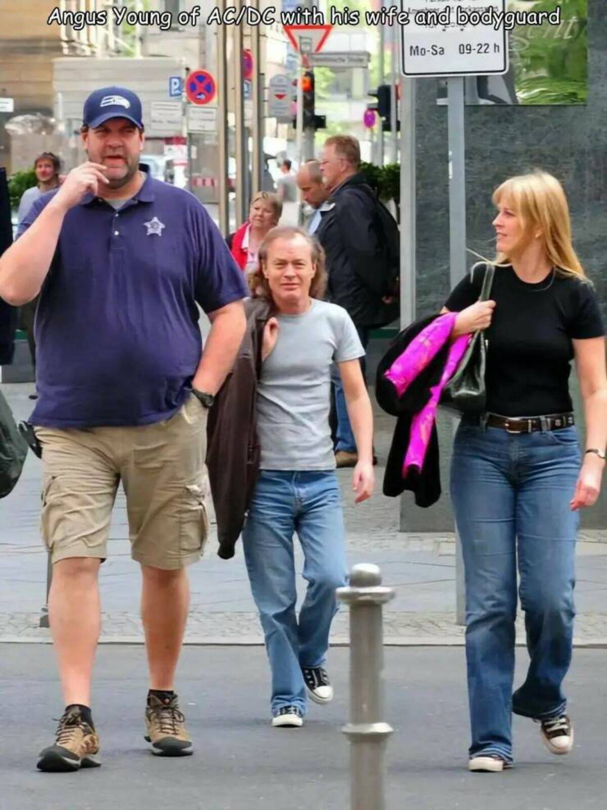 angus young with wife and bodyguard - Angus Young of AcDc with his wife and bodyguard P Bxs MoSa 0922 h