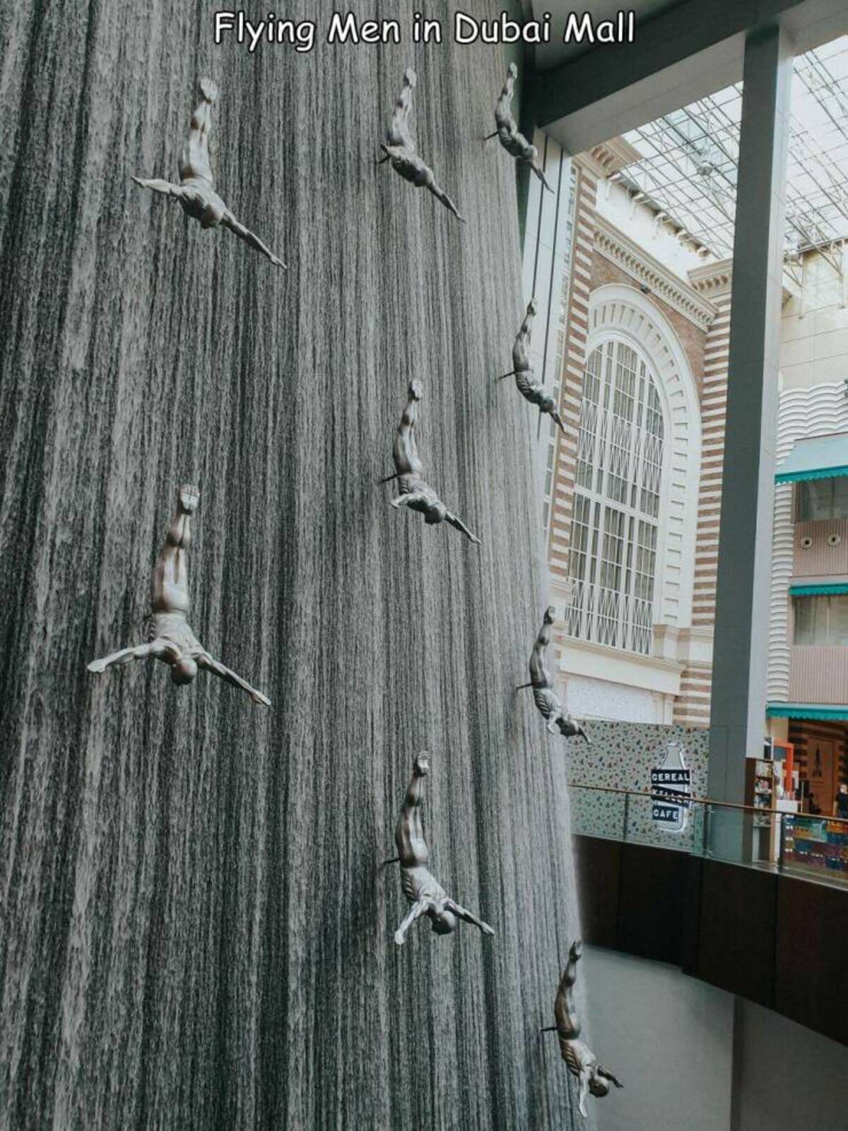 plank - Flying Men in Dubai Mall