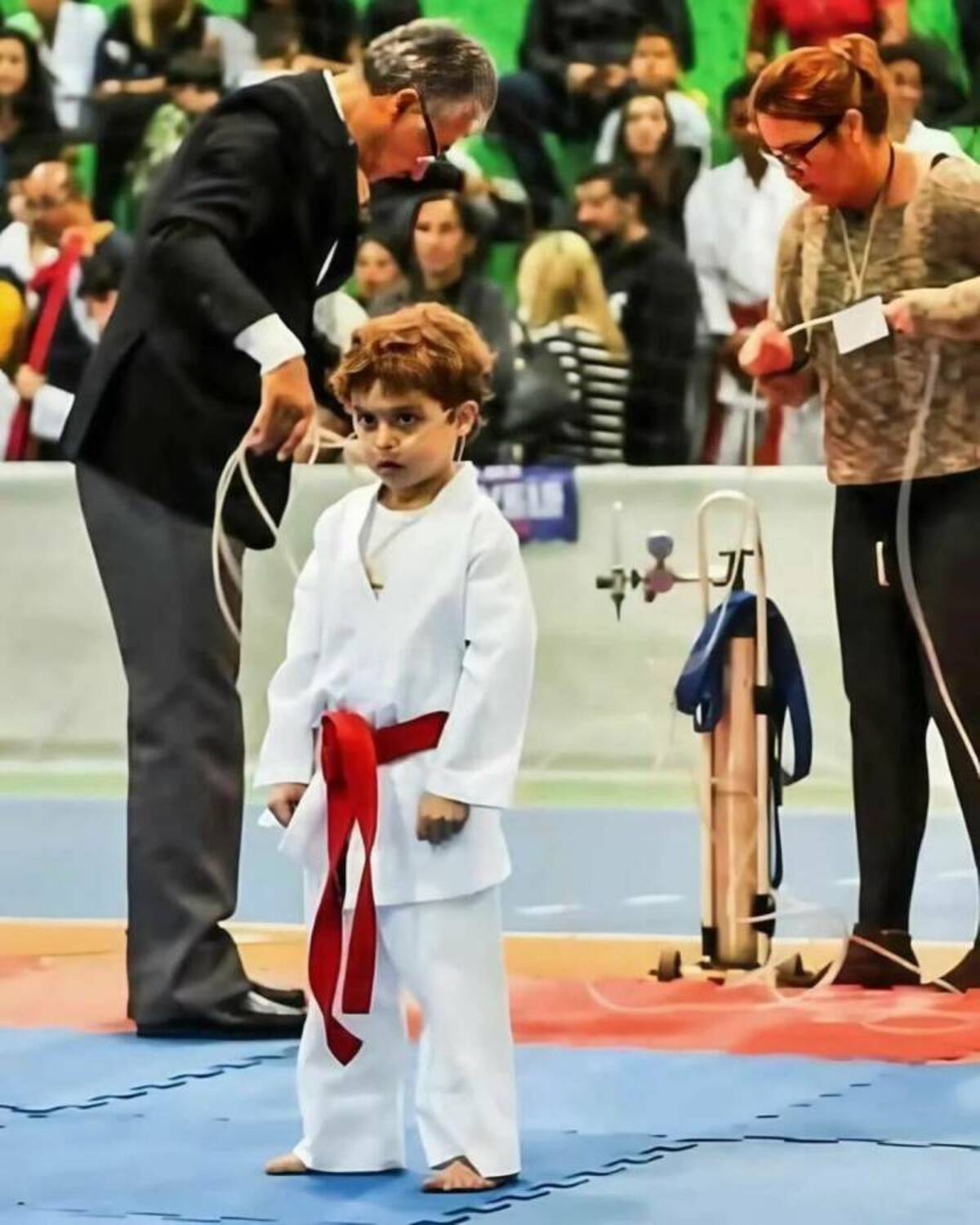 kid fighting karate with oxygen