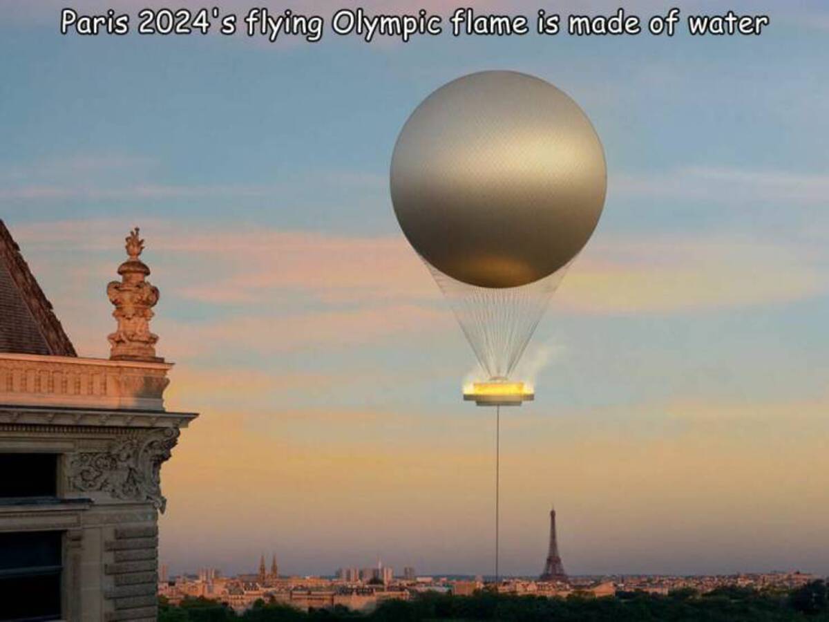 Photograph - Paris 2024's flying Olympic flame is made of water