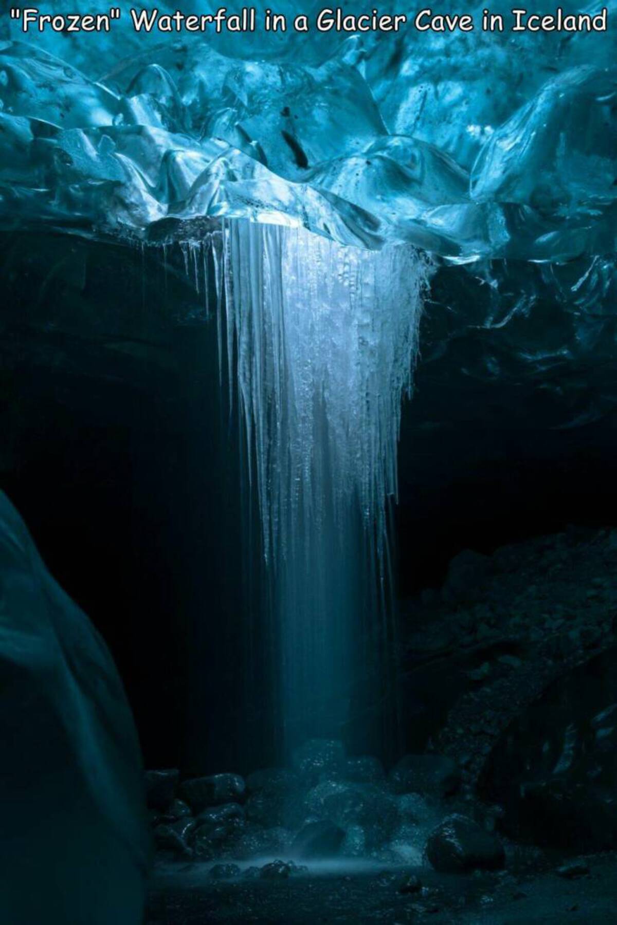 inside glaciers - "Frozen" Waterfall in a Glacier Cave in Iceland