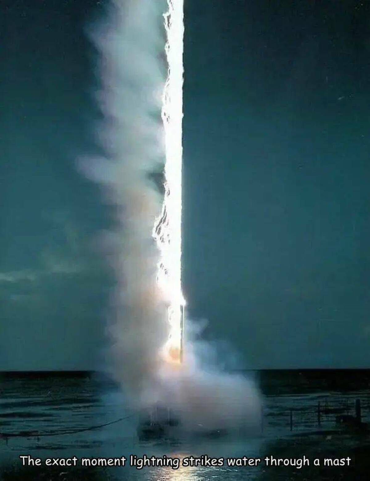 lightning hitting water - The exact moment lightning strikes water through a mast