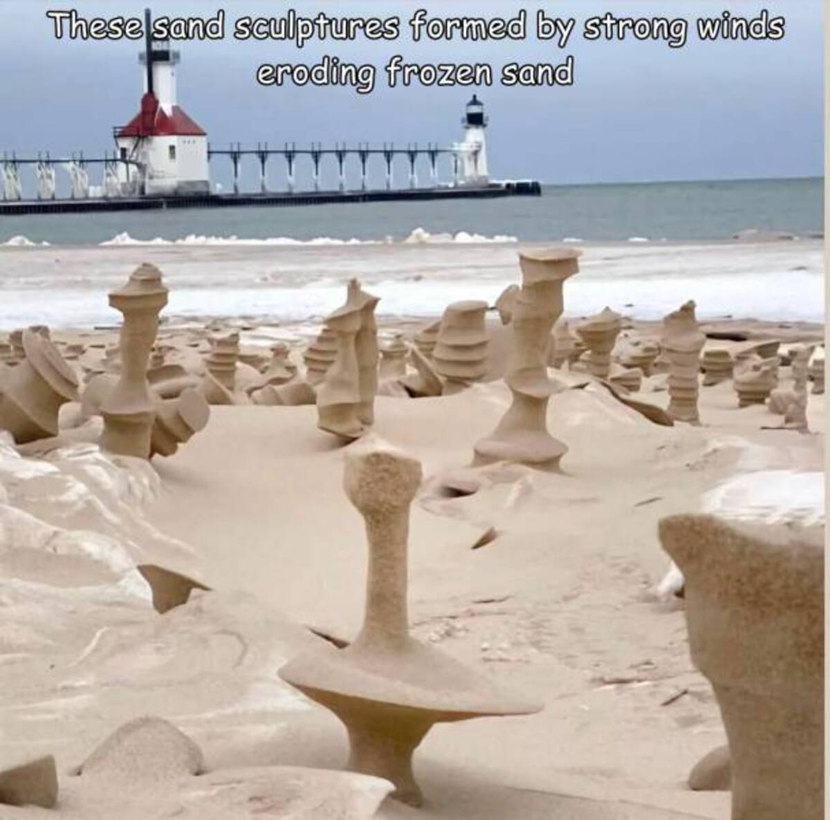 frozen sand sculptures lake michigan - These sand sculptures formed by strong winds eroding frozen sand