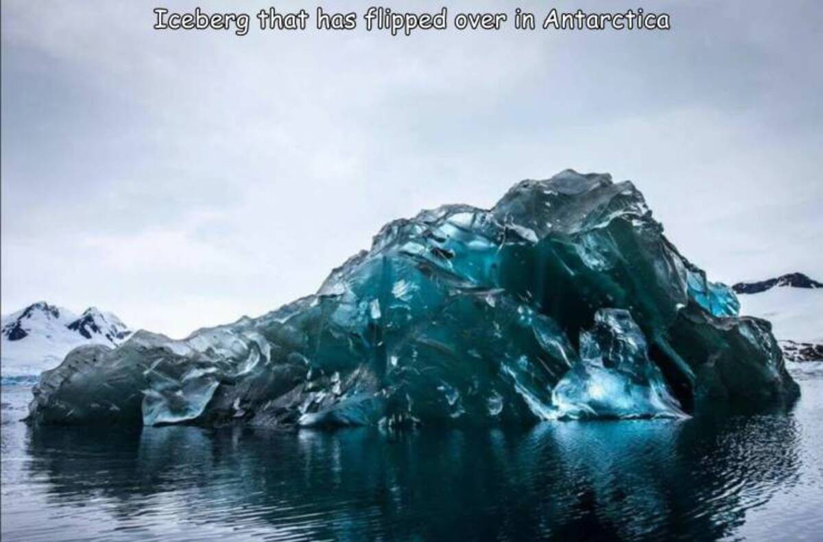 cool photos and funny memes - flipped icebergs - Iceberg that has flipped over in Antarctica