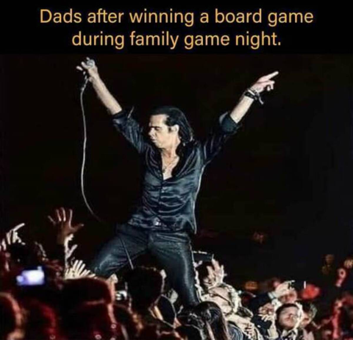 concert nick cave - Dads after winning a board game during family game night.