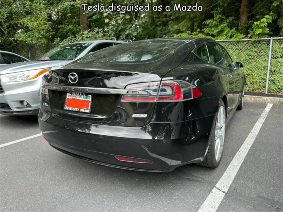 executive car - Tesla disguised as a Mazda Azda Seattle Washington Re University O