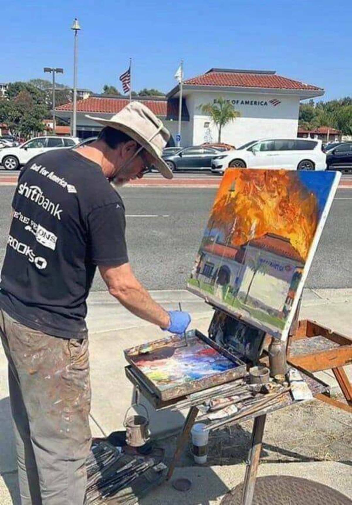 guy paints banks on fire - 8 ad for America shitibank E'Re Ons Rookso Of America