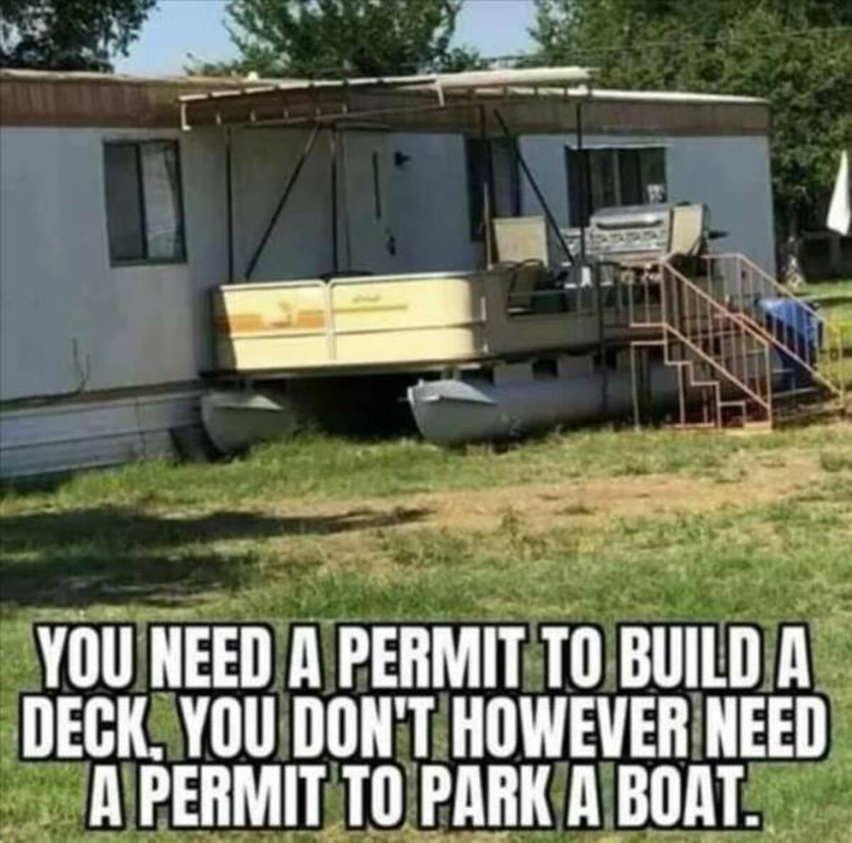 photo caption - You Need A Permit To Build A Deck, You Don'T However Need A Permit To Park A Boat.