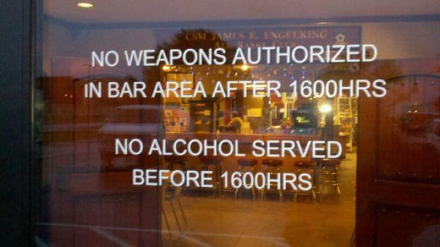 display window - No Weapons Authorized In Bar Area After 1600HRS No Alcohol Served Before 1600HRS