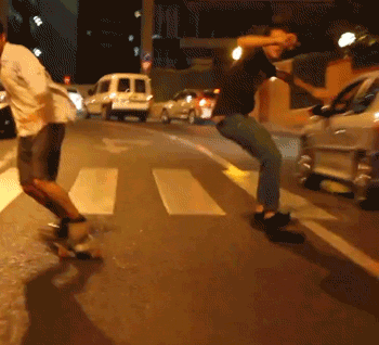 gifs - man falls of a skateboard on the road