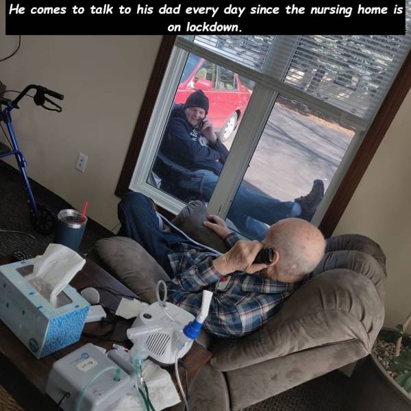 photo caption - He comes to talk to his dad every day since the nursing home is on lockdown.