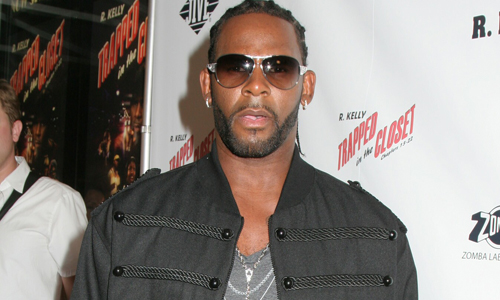 R Kelly arrested for child pornography and peeing on a girl