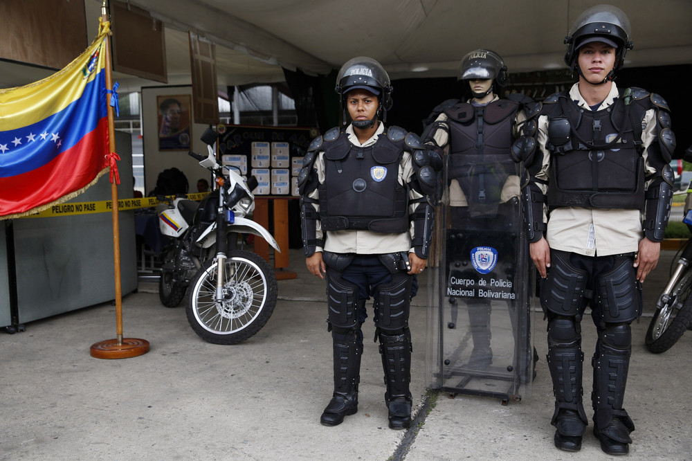 Venezuela's national police officers Bello R and Bogado