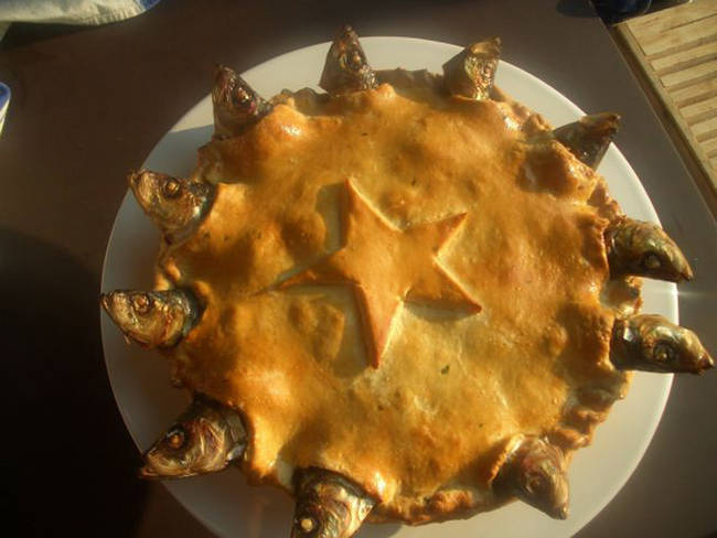 Stargazy Pie, Served in England, the traditional pie comes from Cornwall and is said to honor a fisherman who went out alone to provide fish despite particularly stormy weather