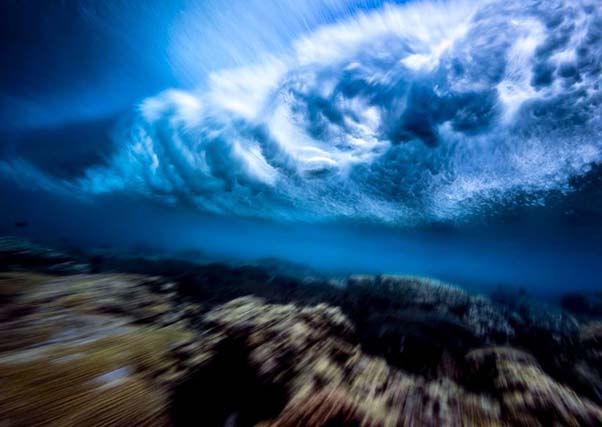 A stunning picture of waves crashing from underneath waves